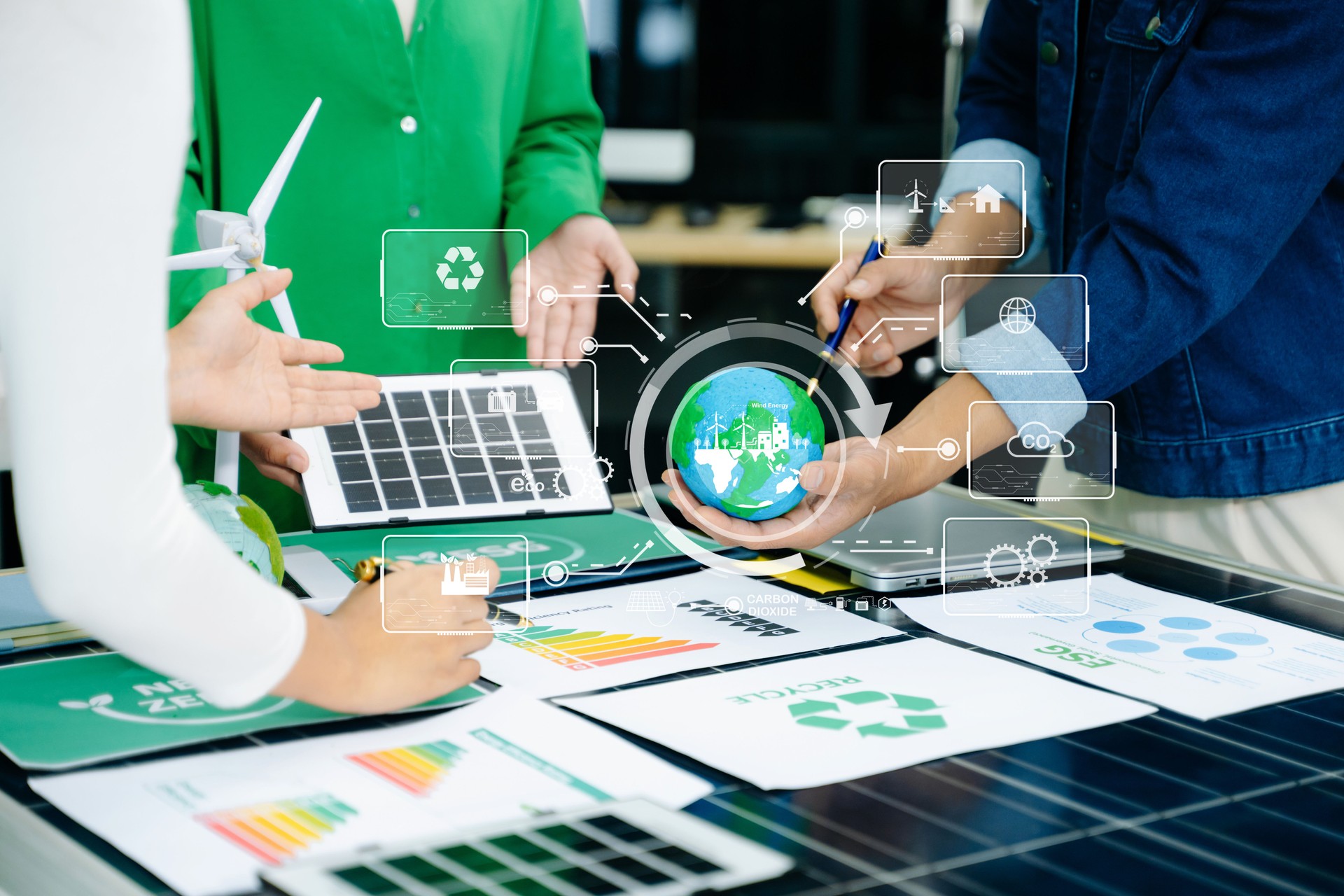 ESG concept of environmental, Green ethical business preserving resources, reducing CO2, Business person team working on laptop virtual smartphone