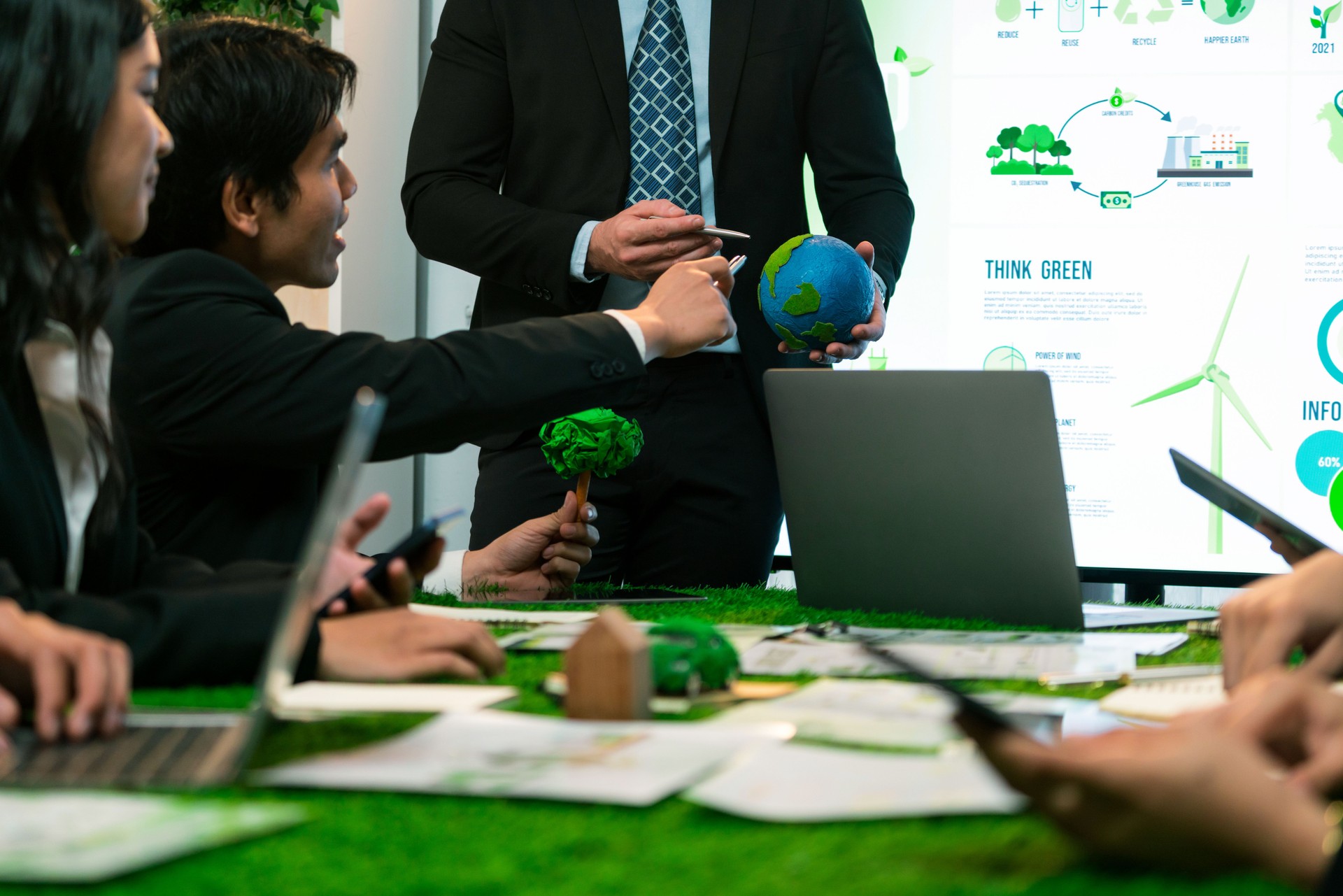 Businessman leader give presentation on eco-friendly implementation. Quaint